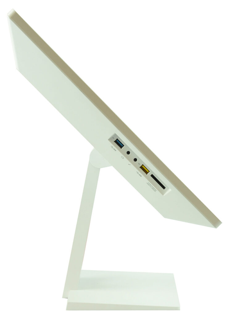 Side view of a white monitor on a stand, showing rear USB and audio ports on the back panel.