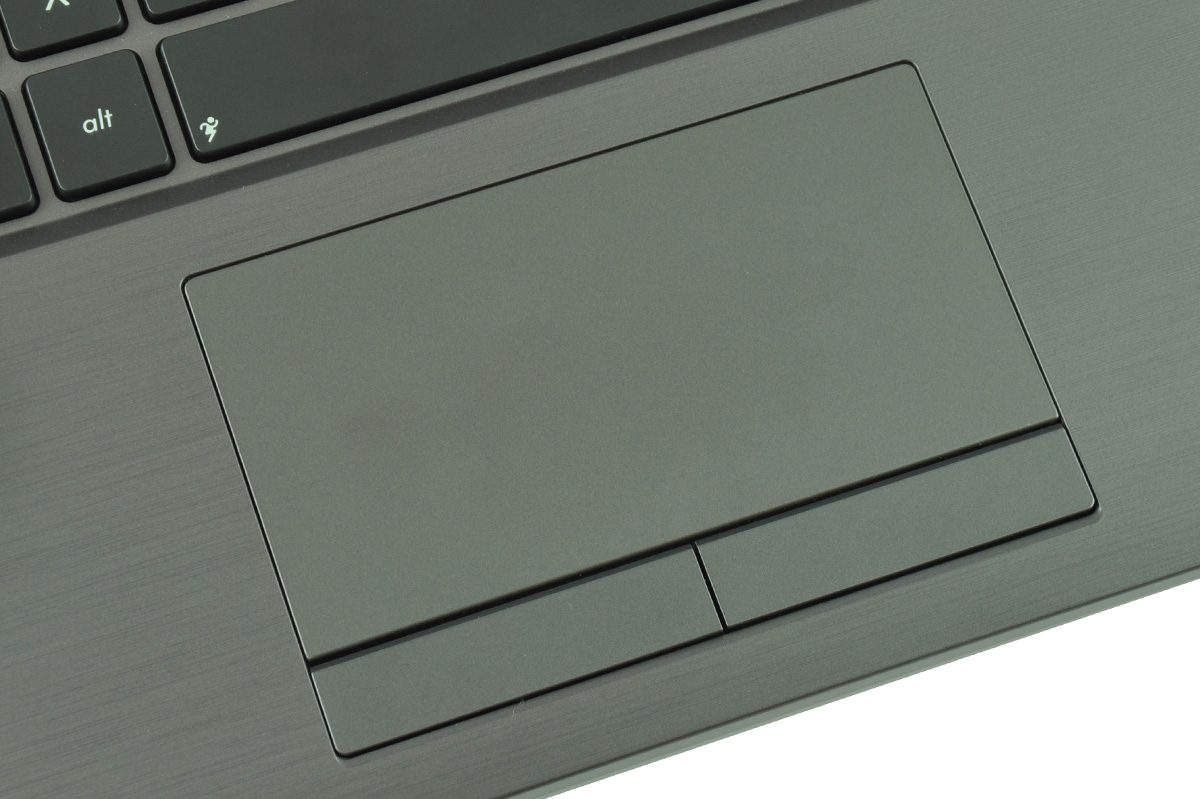 Close-up of a gray laptop touchpad with two adjacent physical buttons below it.