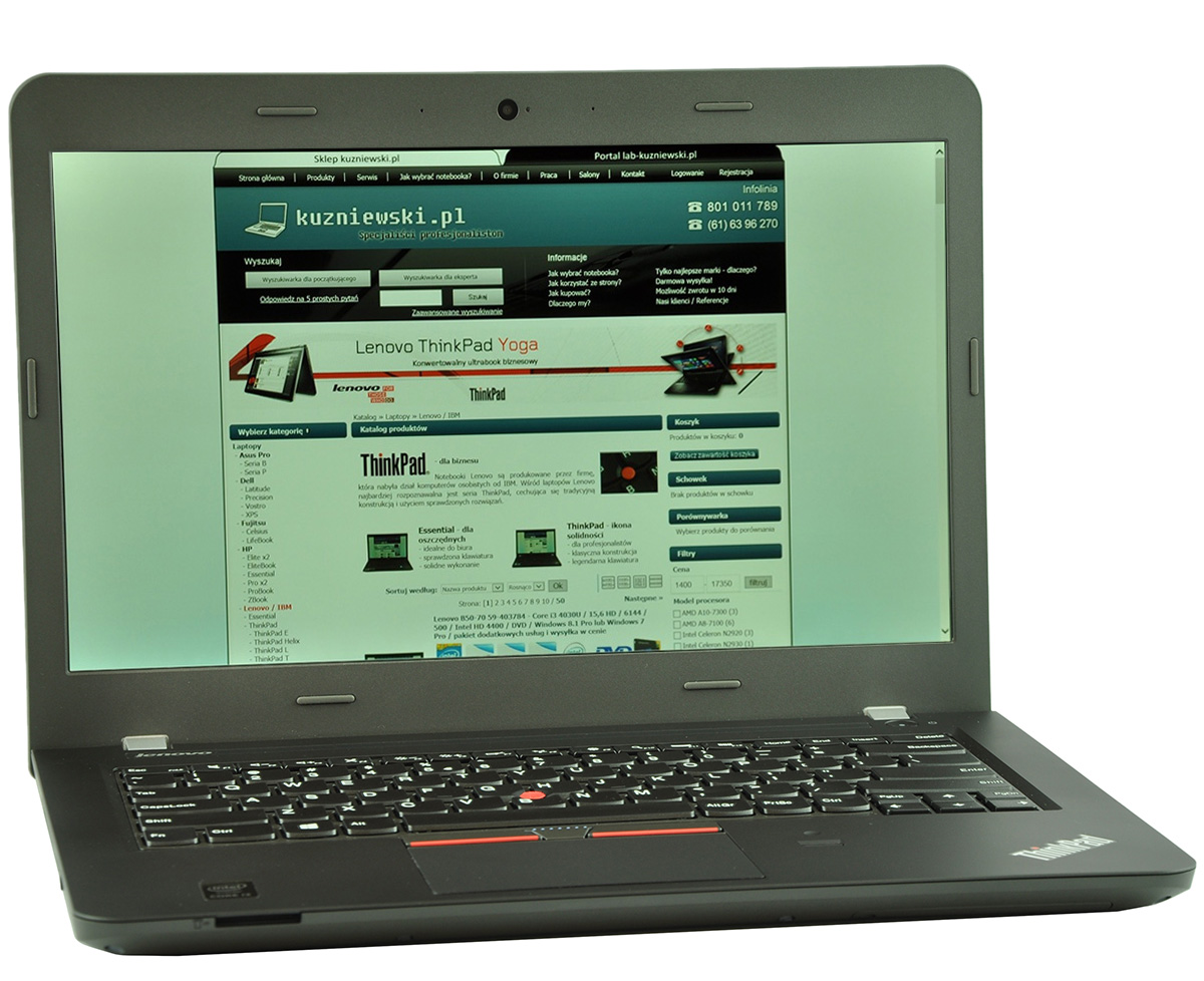 laptop-lenovo-thinkpad-e450-3 - lab-kuzniewski.pl - Testy laptopów, recenzje i porównania Open black Lenovo ThinkPad laptop displaying a Polish website on its screen, with a teal header and navigation bar.