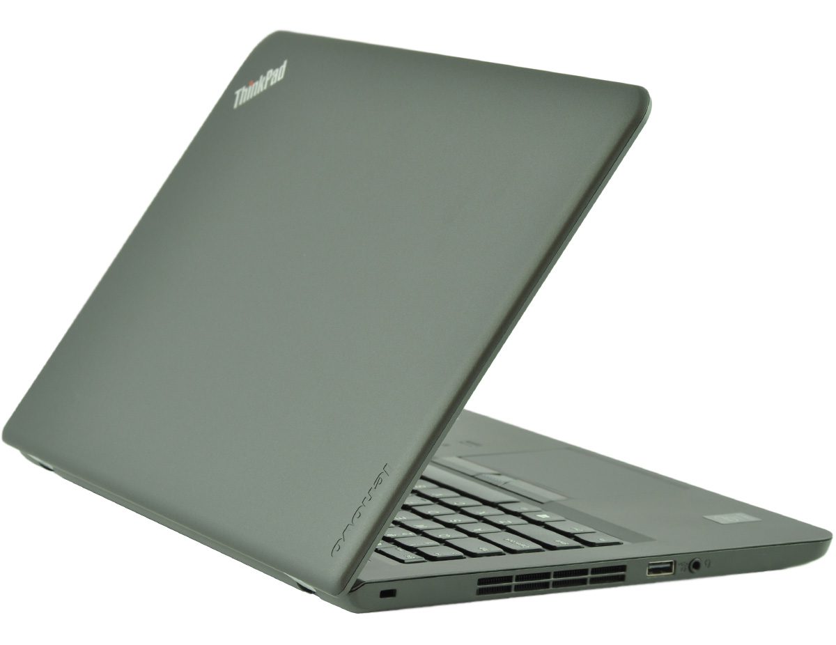 laptop-lenovo-thinkpad-e450-4 - lab-kuzniewski.pl - Testy laptopów, recenzje i porównania Gray ThinkPad laptop partially open, angled to show the keyboard and side vents with the ThinkPad logo visible on the lid