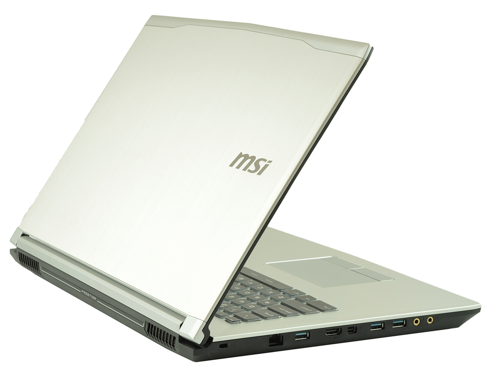 msi-pe70-2qd-core-i7-472_133011 - lab-kuzniewski.pl - Testy laptopów, recenzje i porównania Silver MSI laptop opened at an angle, showing the brushed-metal lid with MSI logo and side ports.