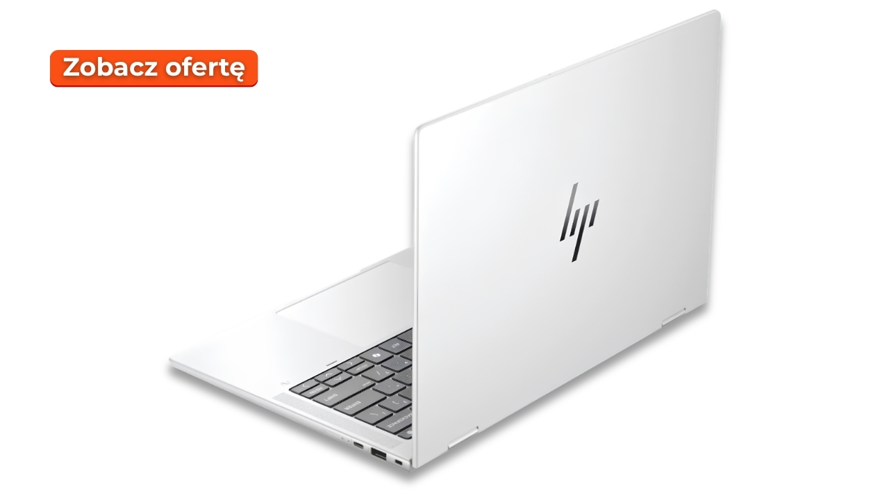 White HP laptop opened at an angle with keyboard visible and an orange 'Zobacz ofertę' badge in the top-left corner.