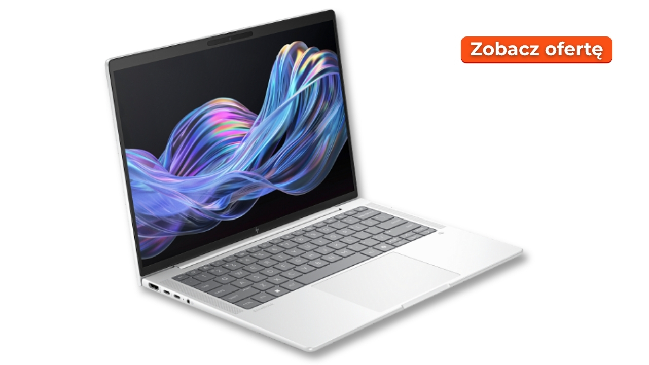 White laptop open to a colorful wallpaper, with an orange 'Zobacz ofertę' button in the top-right.