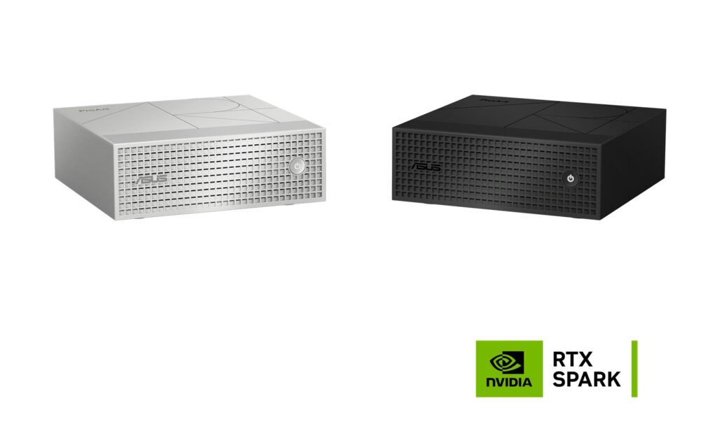 Two compact front-grill computer enclosures side by side, one silver and one black, each with a circular power button on the front panel.
