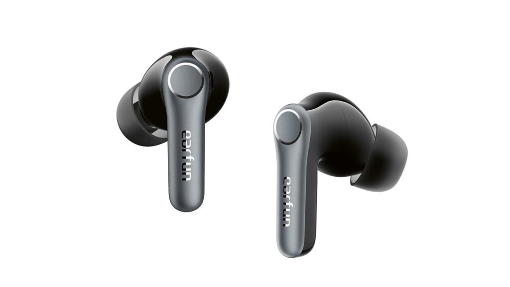 Pair of gray wireless earbuds with black silicone tips and metallic gray stems, facing forward on a white background.