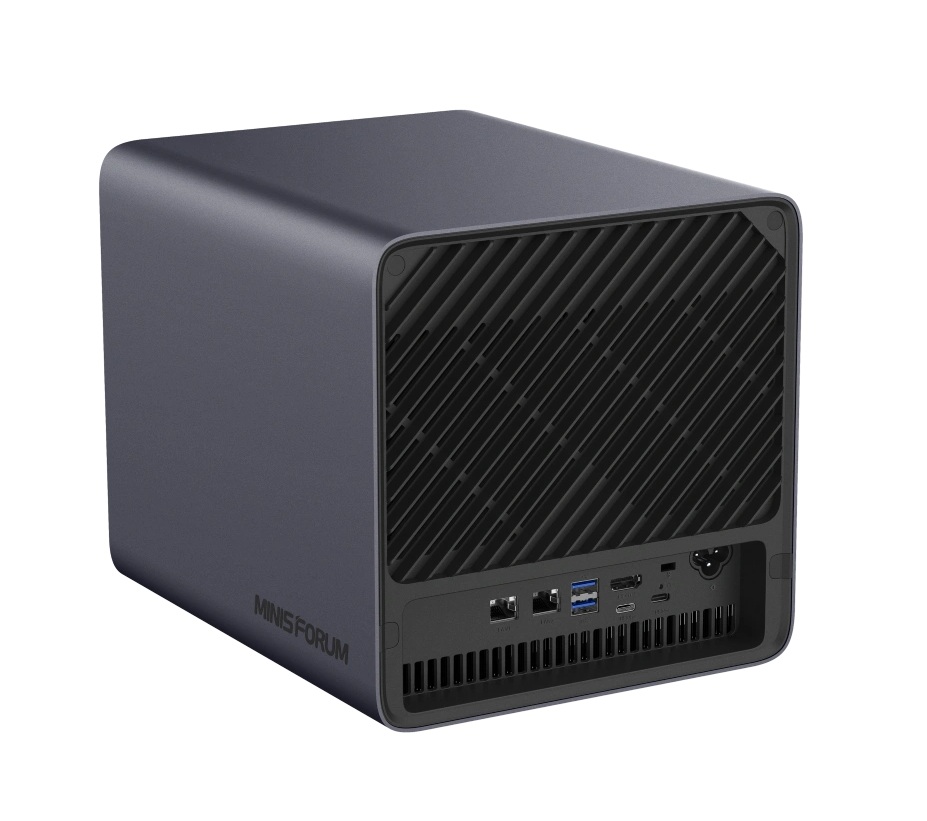 Minisforum N5 MAX-P495_03 - lab-kuzniewski.pl - Testy laptopów, recenzje i porównania Rear view of a dark gray MinisForum mini PC with a diagonal vented panel and a rear I/O block showing Ethernet, USB, USB-C, HDMI, and power ports.