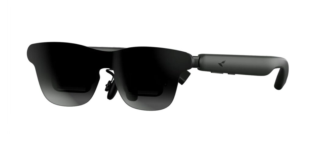Black AR smart glasses with a wraparound dark visor and gray adjustable temple arm.