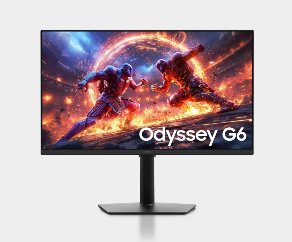 Samsung Odyssey G60H_01 - lab-kuzniewski.pl - Testy laptopów, recenzje i porównania Samsung Odyssey G6 gaming monitor on a stand displaying a fiery action game scene with two armored fighters.