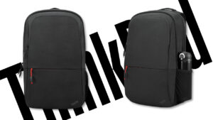 Lenovo_4X41C12468 _2010_A - lab-kuzniewski.pl - Testy laptopów, recenzje i porównania Two black backpacks shown from front and three-quarter views on a white background with red zipper pulls.