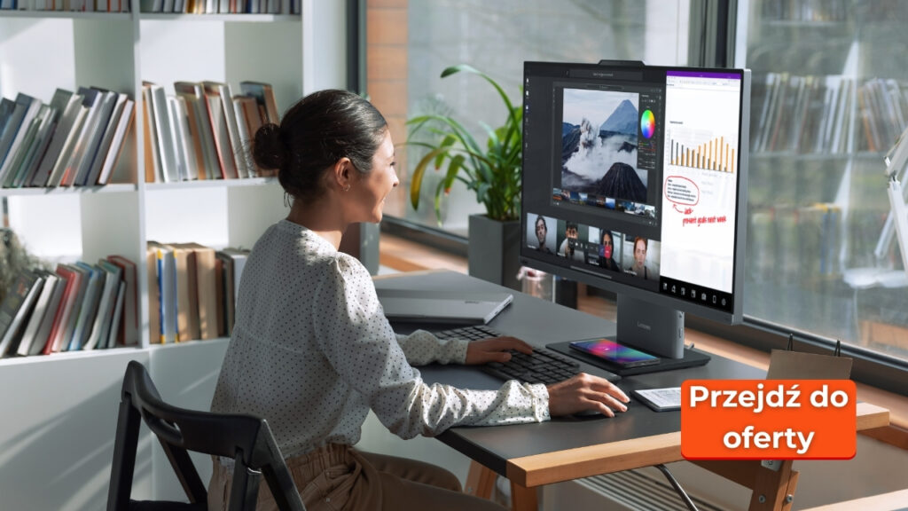 Woman sits at a desk using a large monitor to edit photos, with bookshelves and plants in a bright office; a bright orange 'Go to offer' badge overlaps the corner.